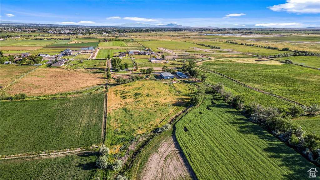 Birds eye view of property with a rural view