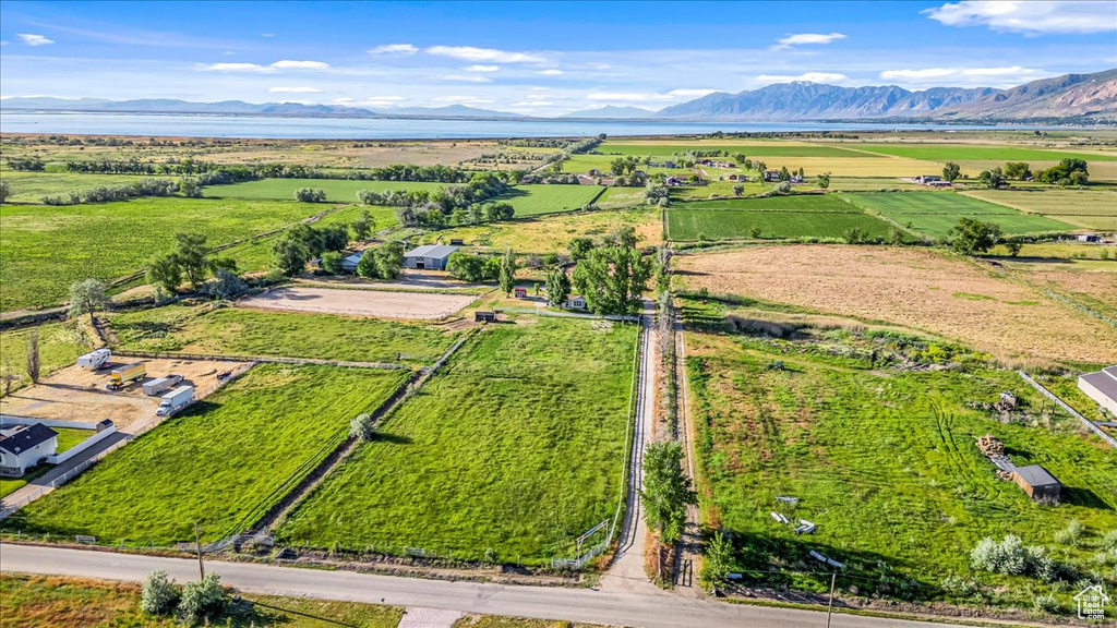 Aerial view featuring a rural view and a mountain view