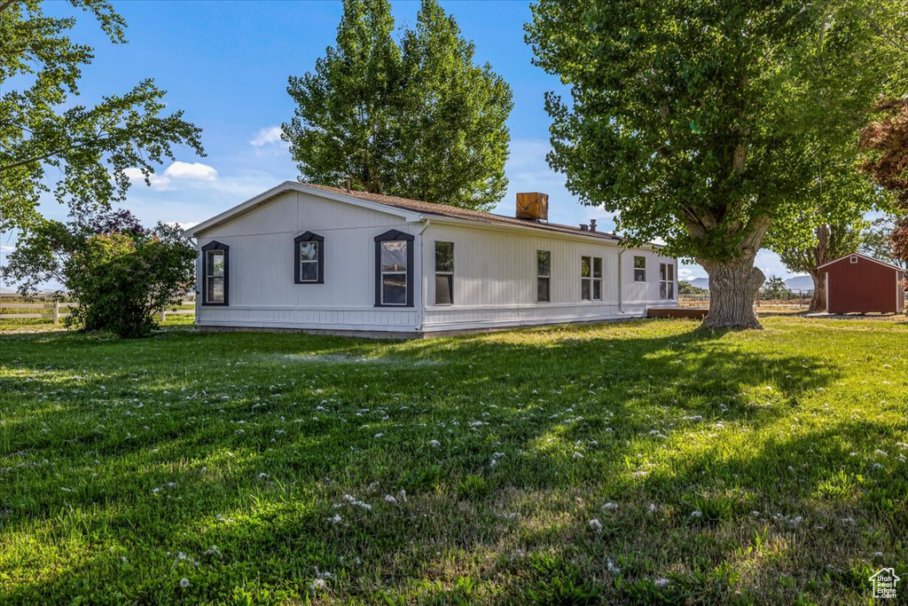 View of front of home with a front yard