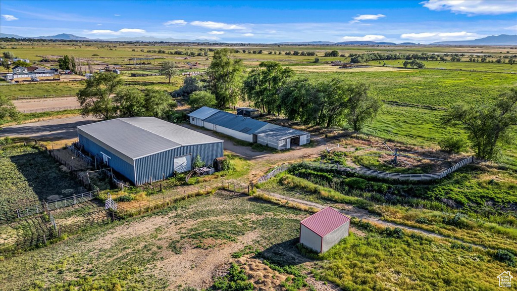 Birds eye view of property featuring a rural view and a mountain view