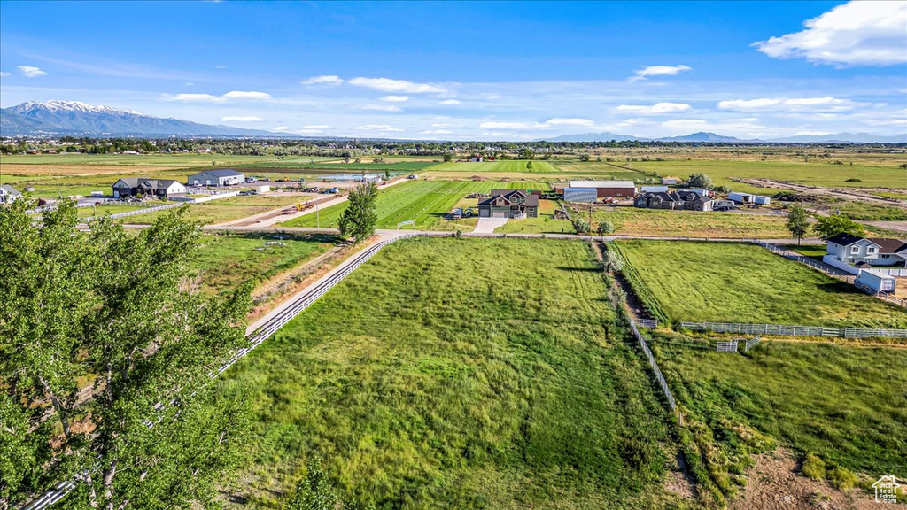 Birds eye view of property with a mountain view