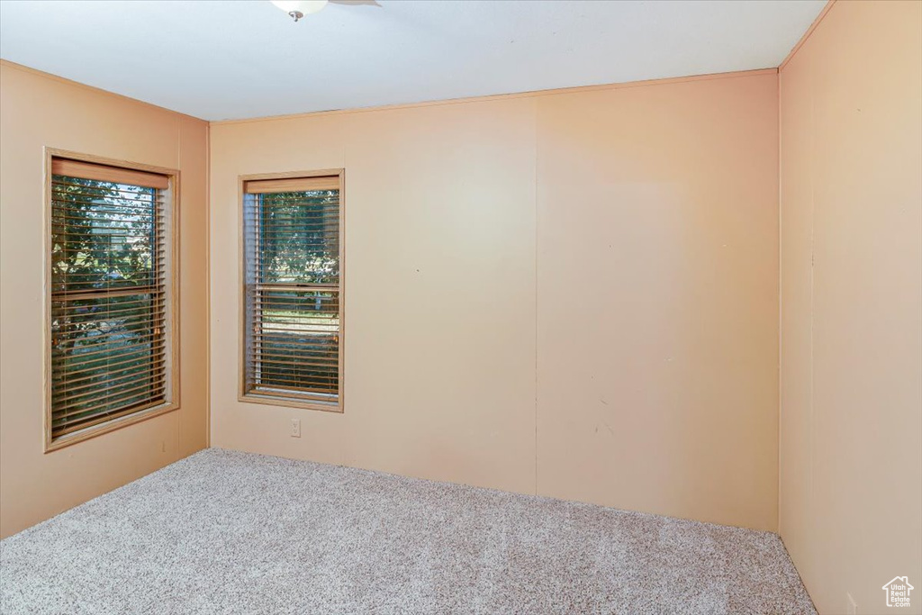 Empty room featuring carpet flooring