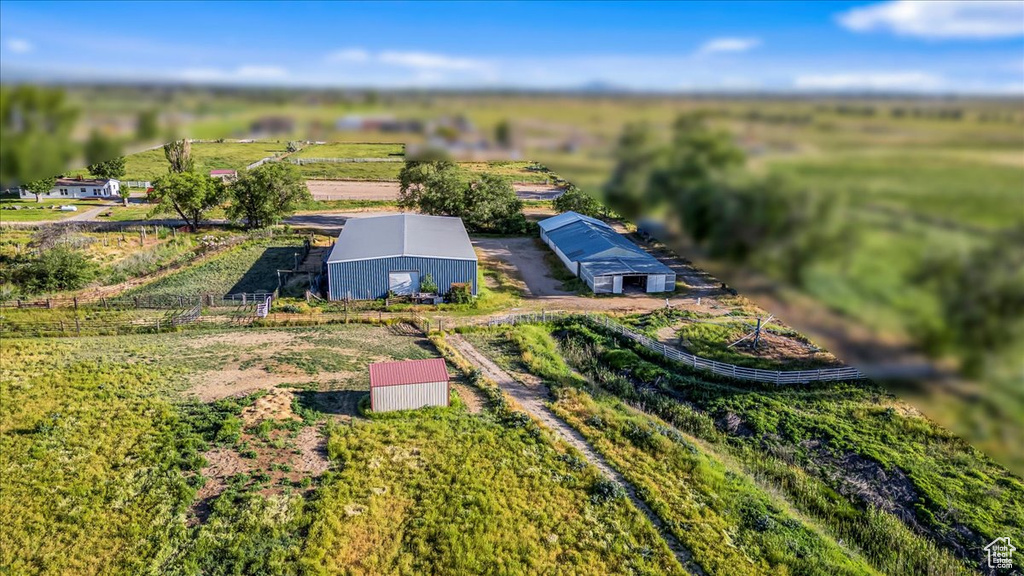 Birds eye view of property featuring a rural view