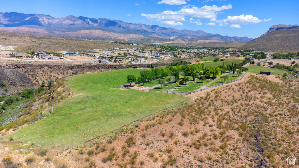 Birds eye view of property featuring a mountain view