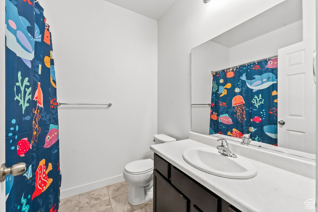 Bathroom with vanity and toilet