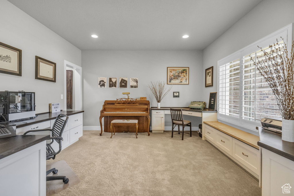 Office area featuring light colored carpet