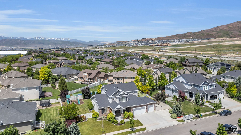 Birds eye view of property with a mountain view