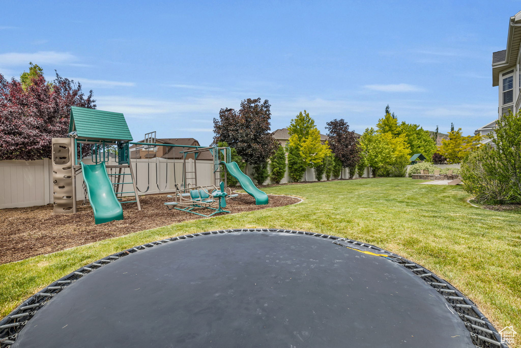 View of yard with a playground