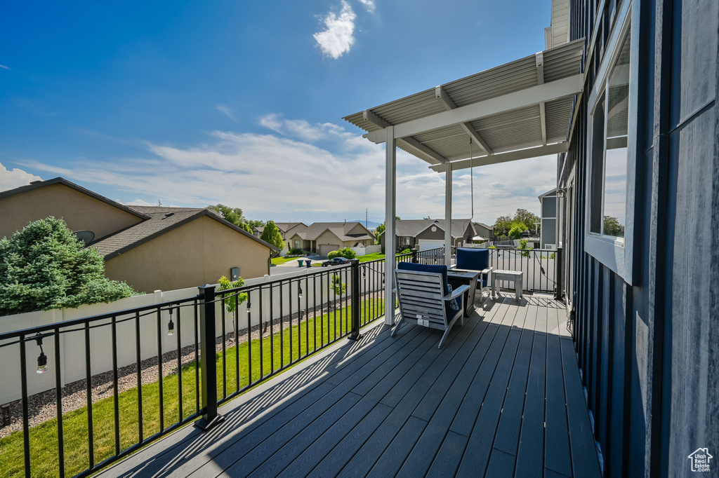 Wooden terrace with a lawn