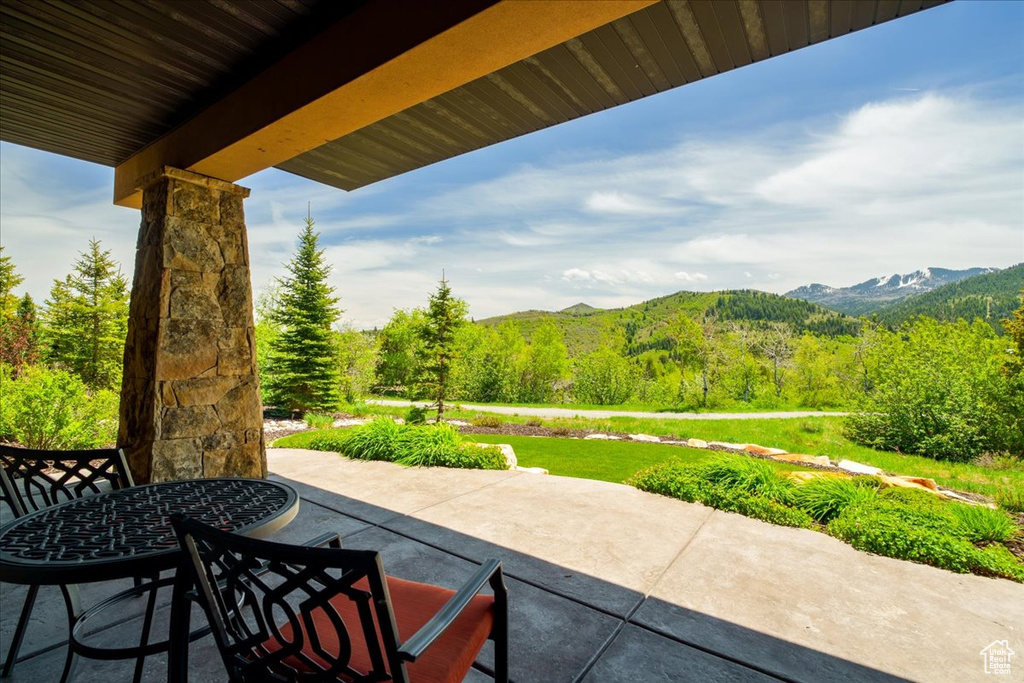 View of patio / terrace featuring a mountain view