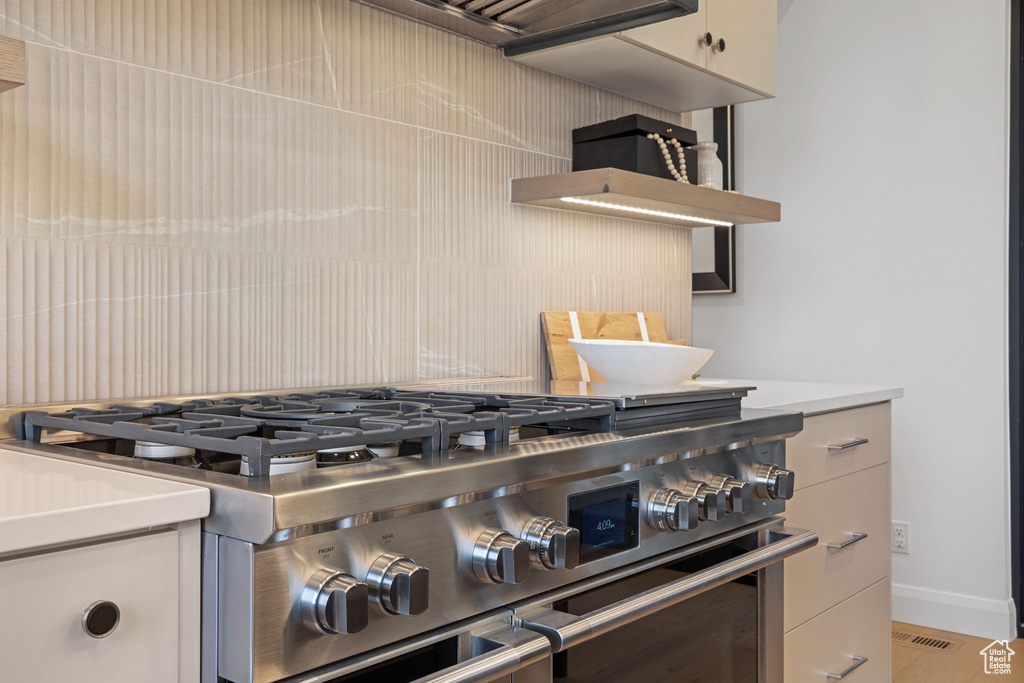 Kitchen featuring range with two ovens