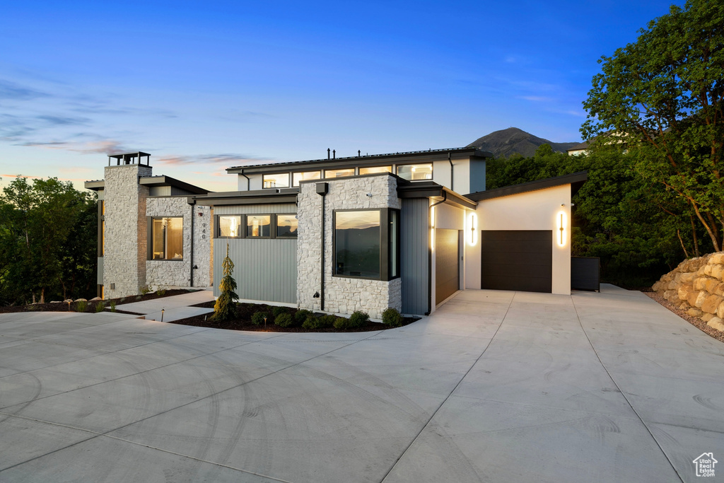 View of front of home with a garage