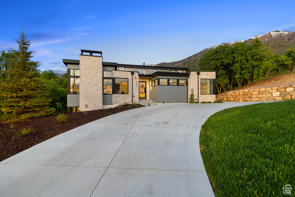 View of front of home with a mountain view