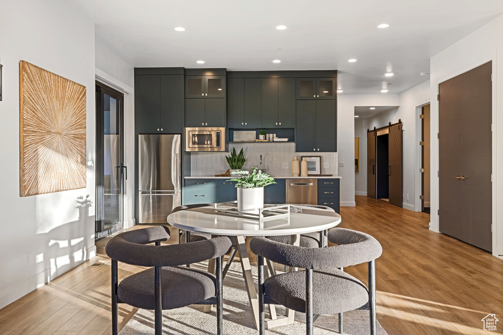 Dining room featuring light hardwood / wood-style flooring