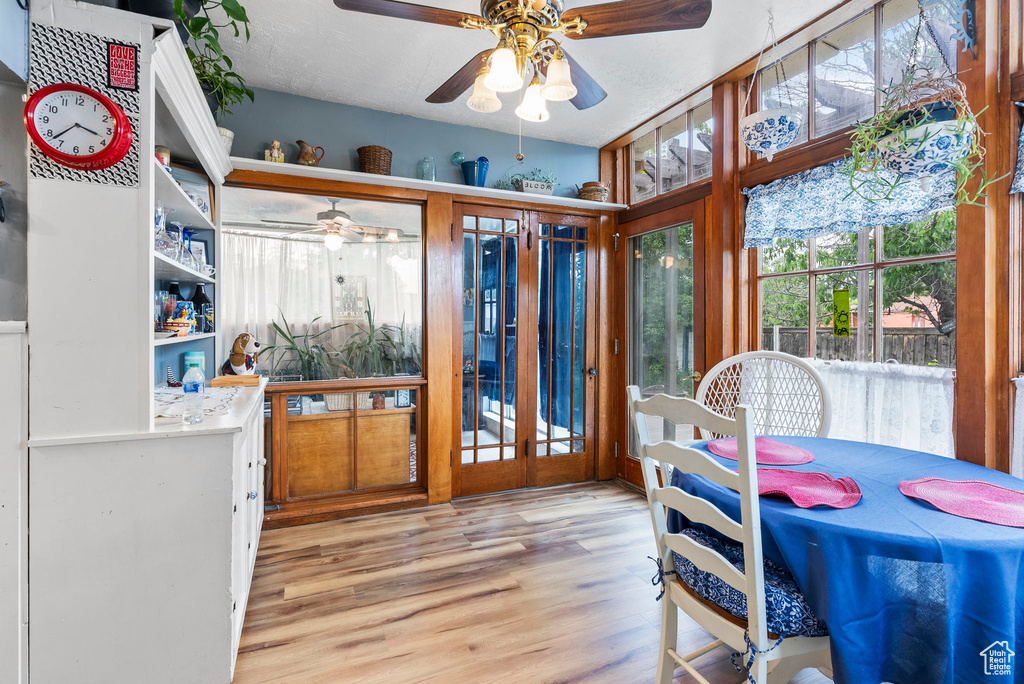 Interior space featuring ceiling fan and light hardwood / wood-style floors