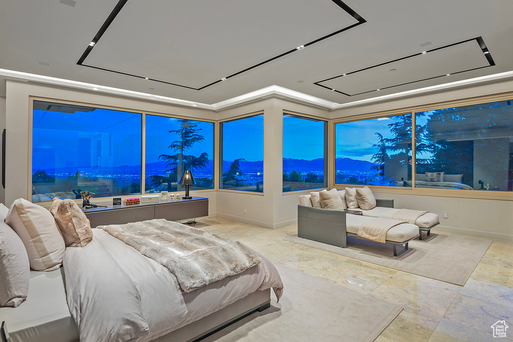 Tiled bedroom featuring a mountain view