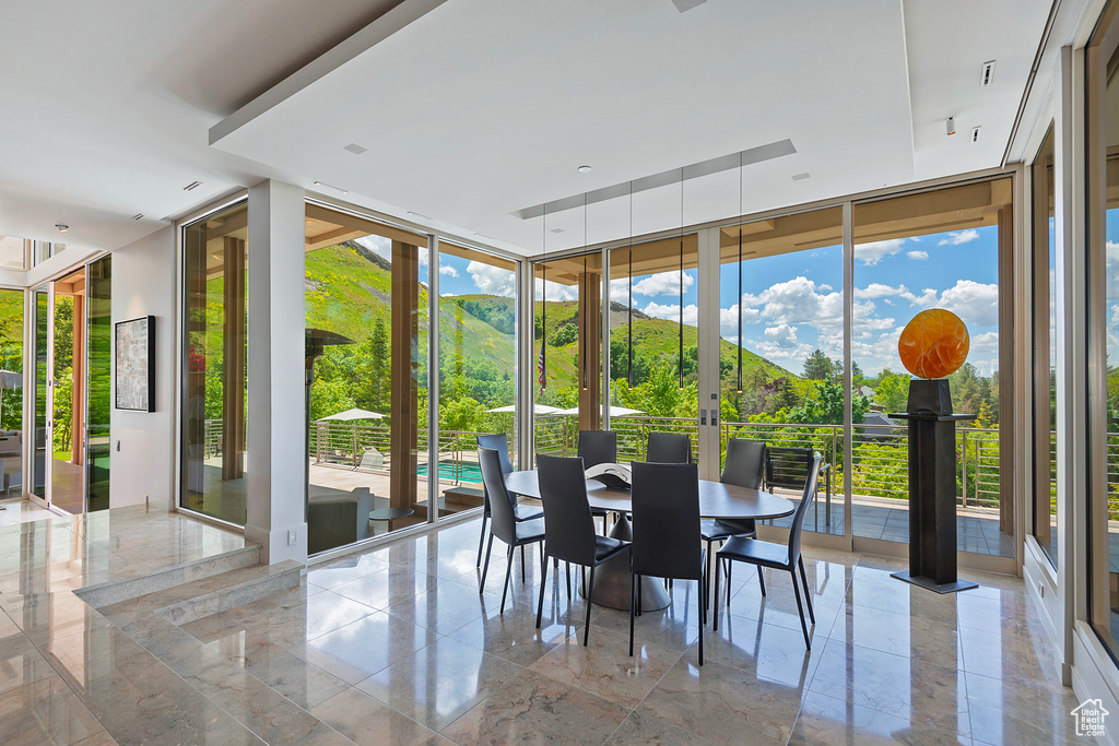 Sunroom featuring french doors