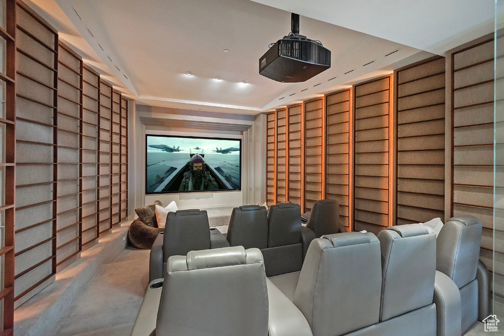 Home theater featuring a tray ceiling