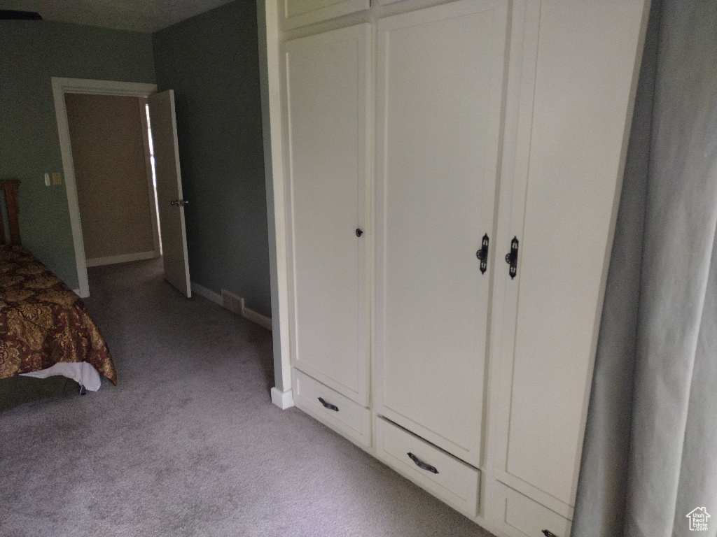 Bedroom with carpet flooring