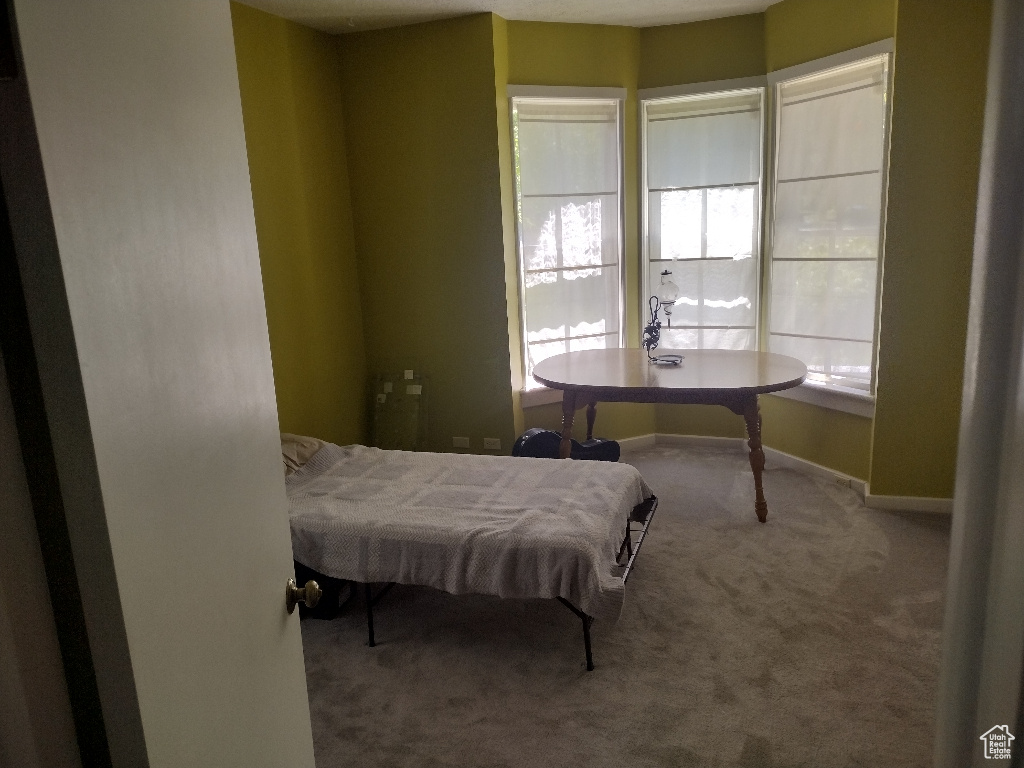 Bedroom featuring carpet flooring