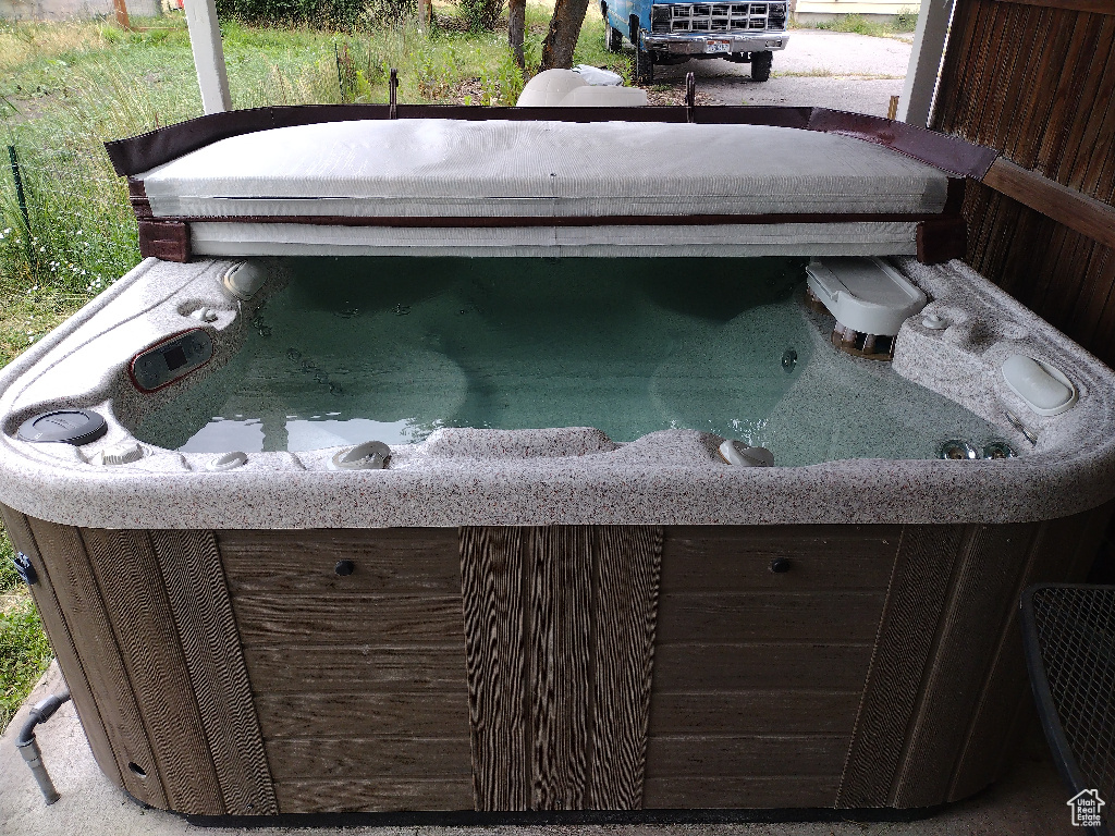 Exterior details with a jacuzzi