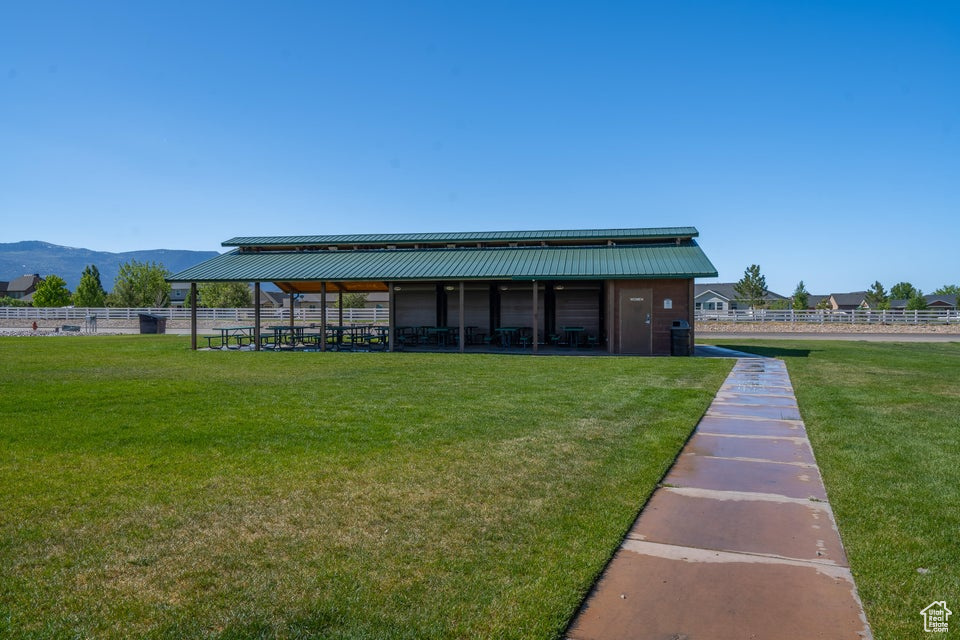 Exterior space with a yard