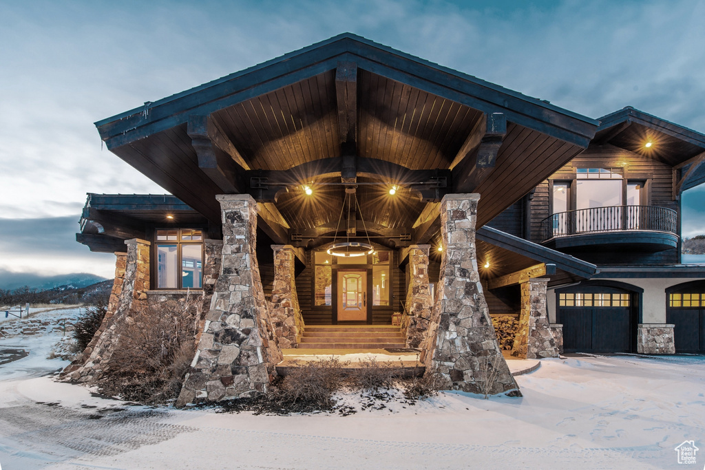 Craftsman-style home featuring a balcony