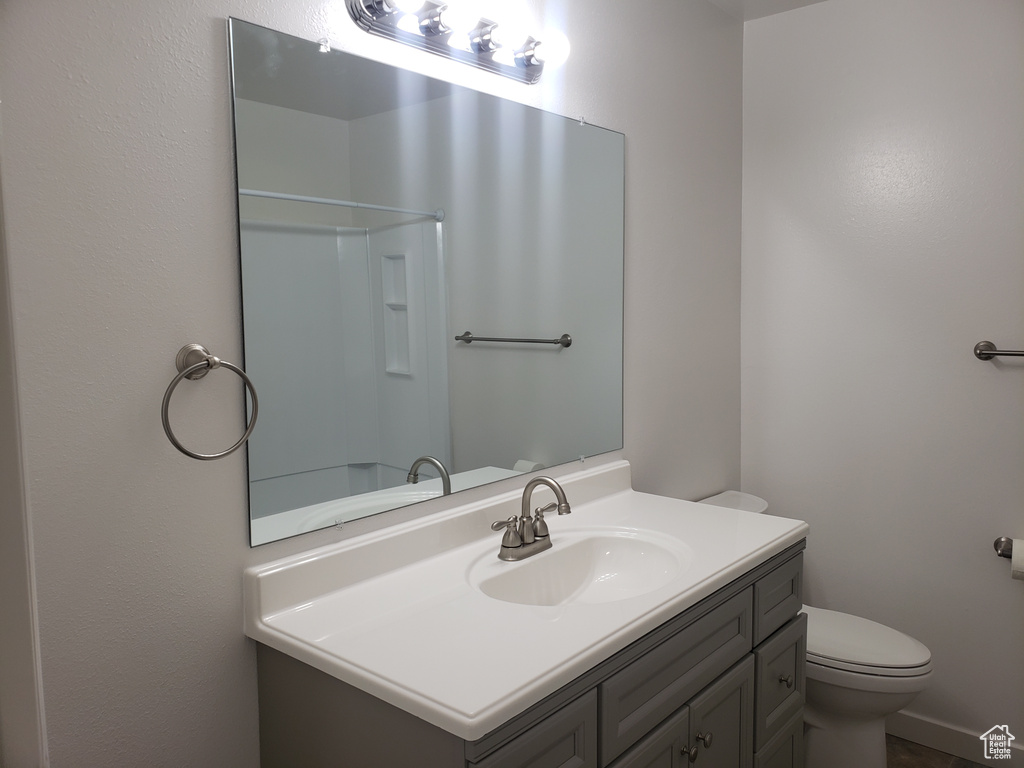 Bathroom with vanity and toilet