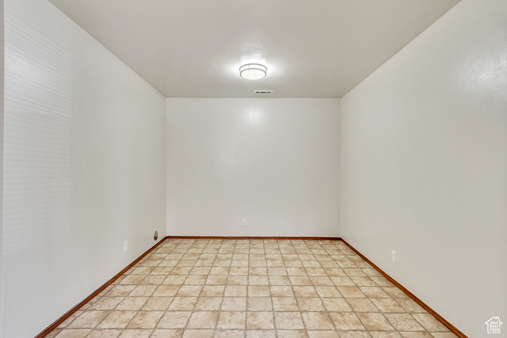 View of tiled empty room