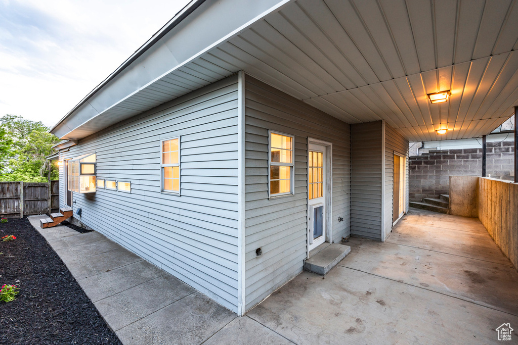 View of property exterior featuring a patio