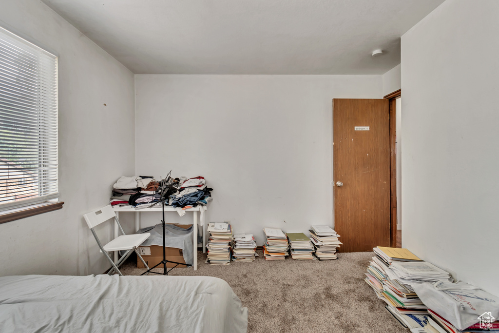 Bedroom featuring carpet flooring