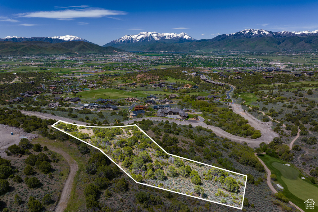 Birds eye view of property featuring a mountain view