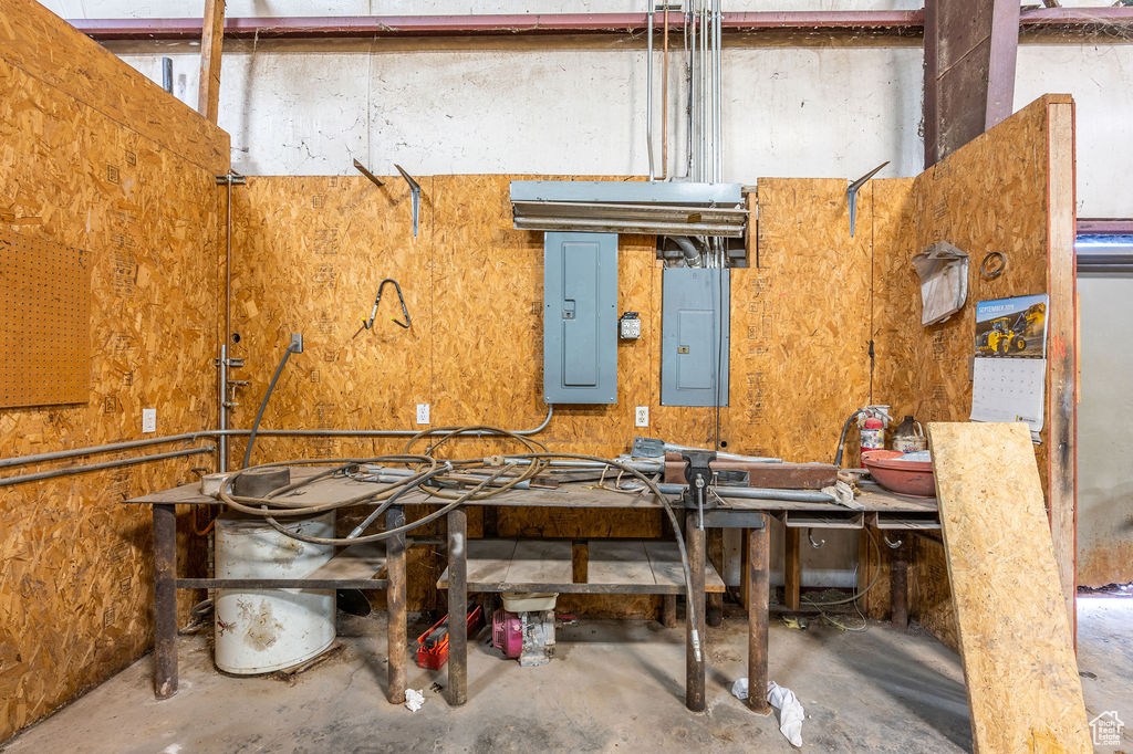 Interior space featuring concrete floors and a workshop area