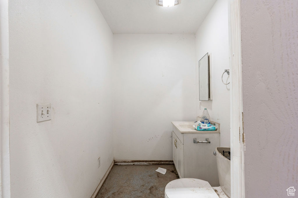 Bathroom with vanity and toilet