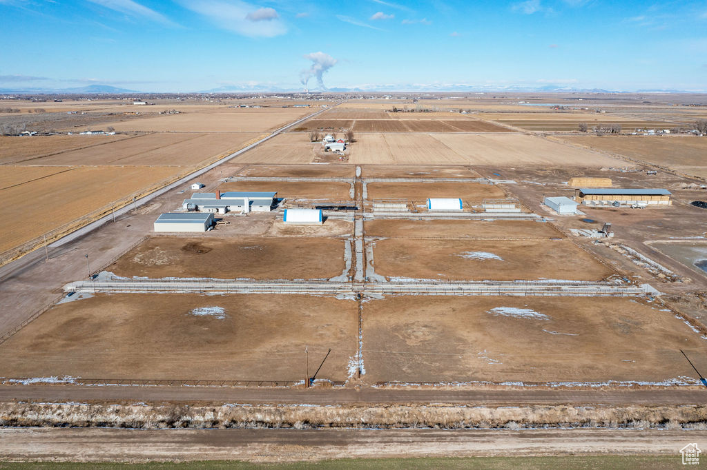 Birds eye view of property featuring a rural view