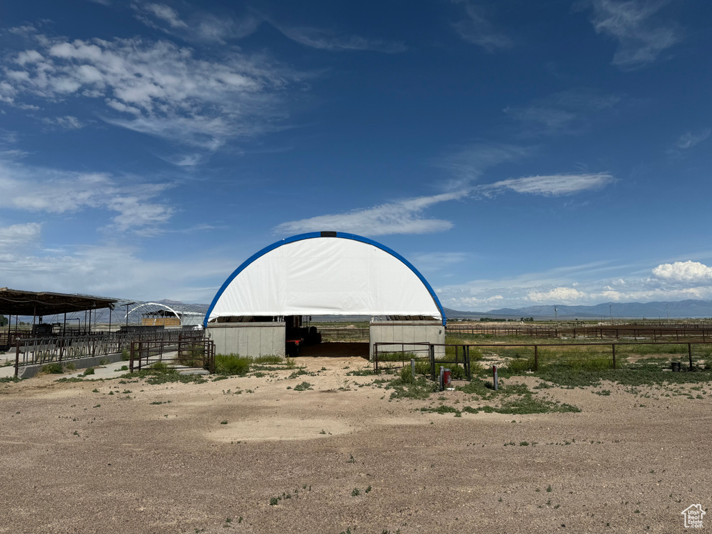 View of shed / structure featuring a rural view