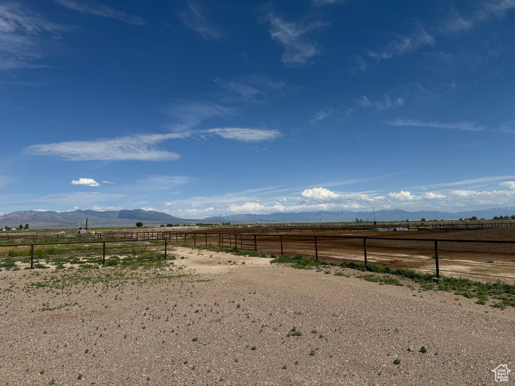 View of yard featuring a mountain view and a rural view