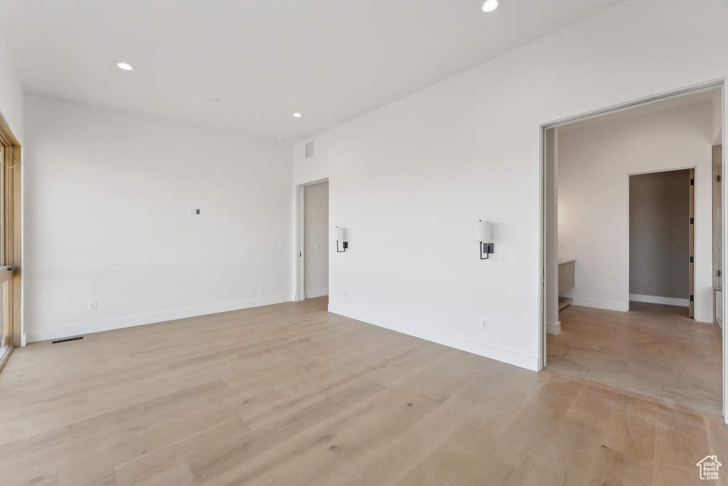 Spare room with light hardwood / wood-style flooring