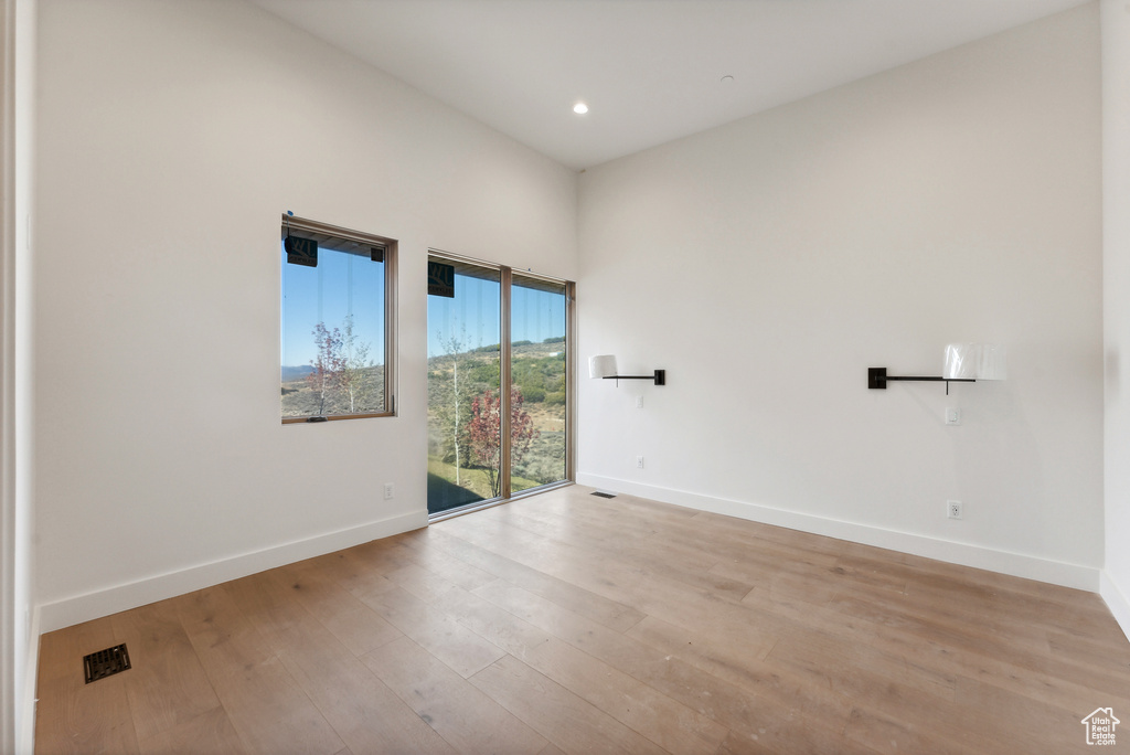 Unfurnished room featuring light hardwood / wood-style flooring