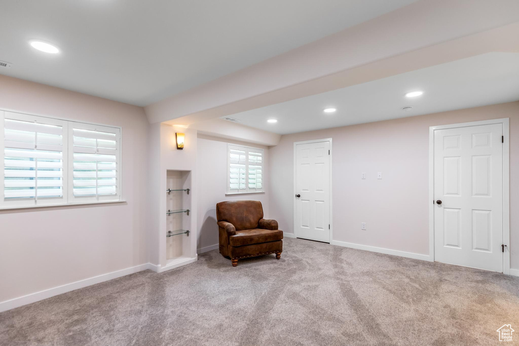 Living area featuring carpet flooring