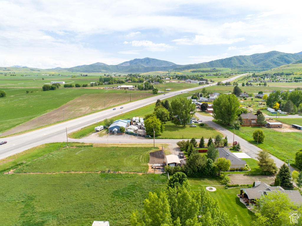 Aerial view featuring a rural view and a mountain view