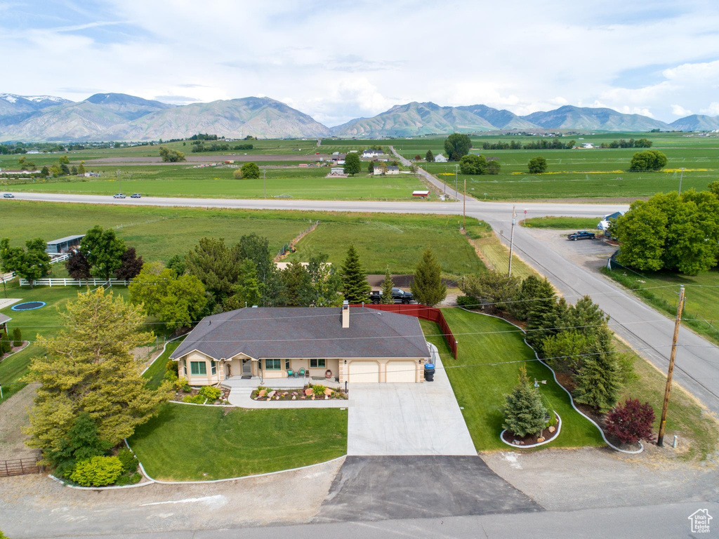 Drone / aerial view featuring a mountain view and a rural view