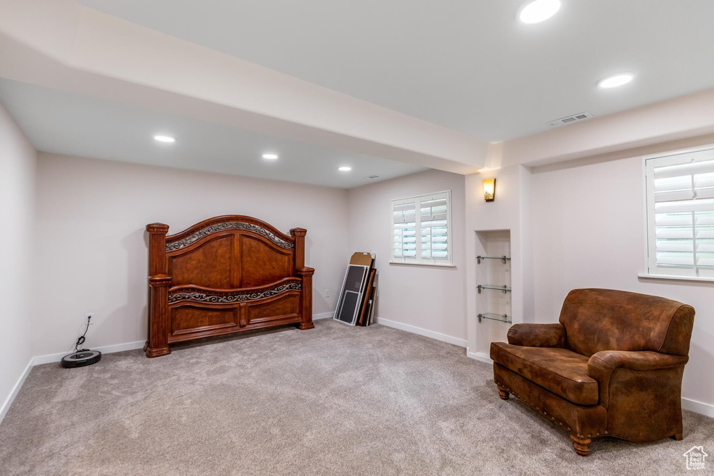 Living area featuring carpet flooring