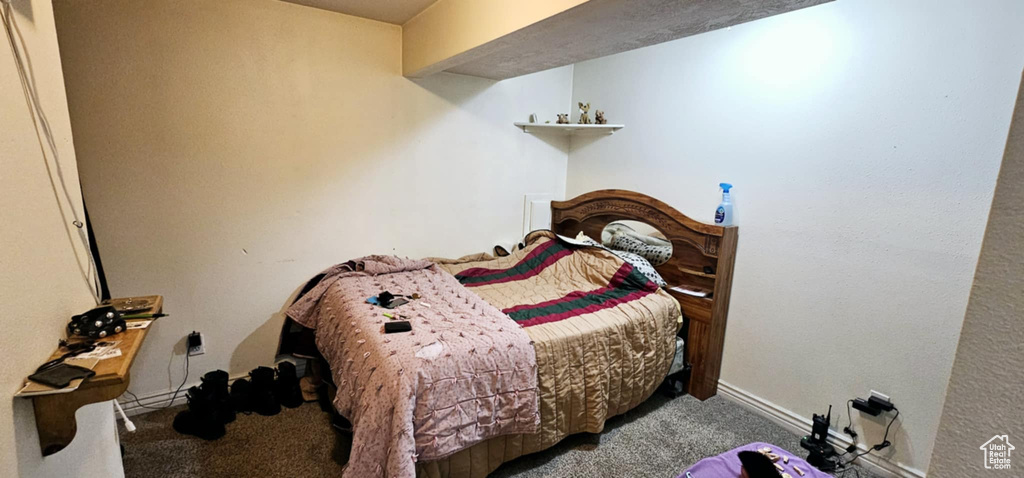 Bedroom featuring carpet flooring