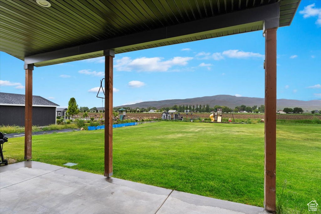 View of terrace featuring a mountain view