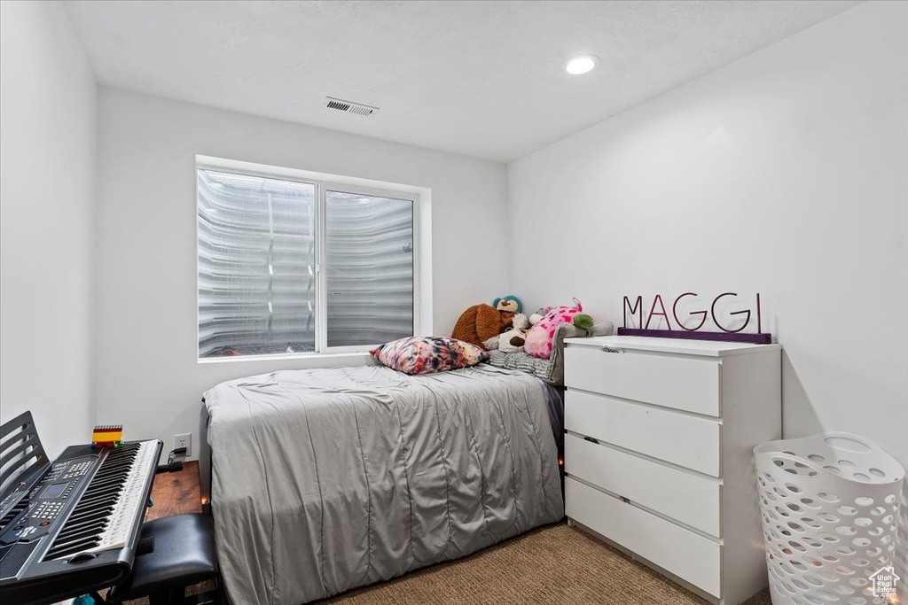 View of carpeted bedroom