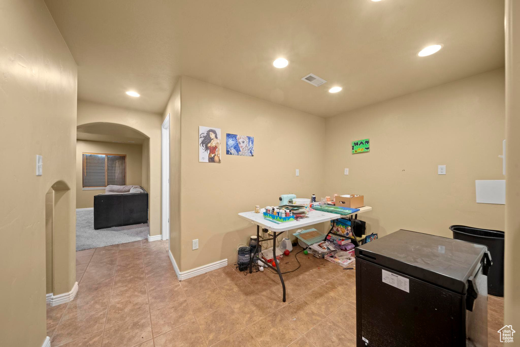 Interior space with light tile floors