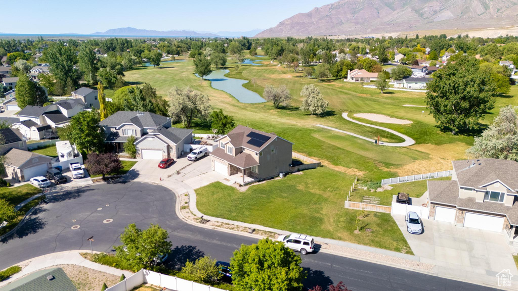 Birds eye view of property with a mountain view