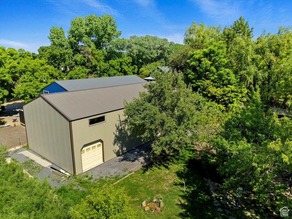 View of outdoor structure with a garage