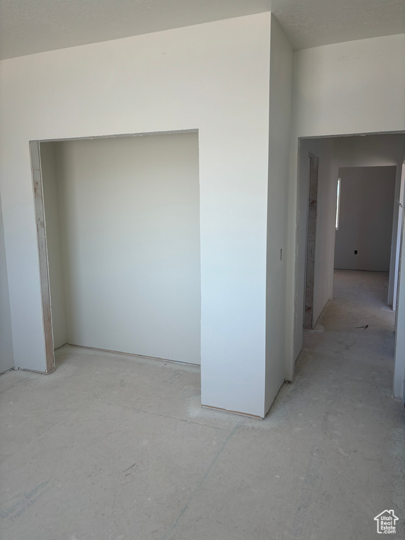 Spare room with concrete floors